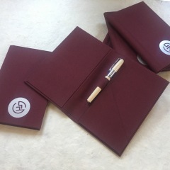 Pocket Folders with Pen Loop Covered in Burgundy with Matte Silver Foil Stamping