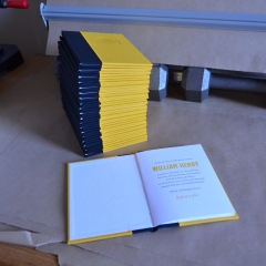 Invitation Booklet with Black and Yellow Cover and Blind Deboss