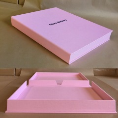 Notched Clamshell Box Covered in Light Pink with Black Foil Stamping