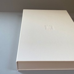 Notched Half Clamshell Box Covered in Ivory and Lined in Smoke with Blind Debossed Logo